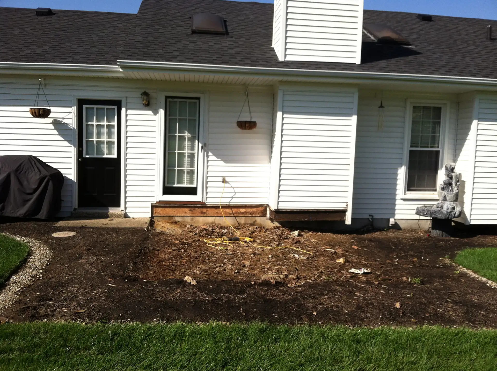 Jeff-Hancock-Before-scaled area cleared for new patio